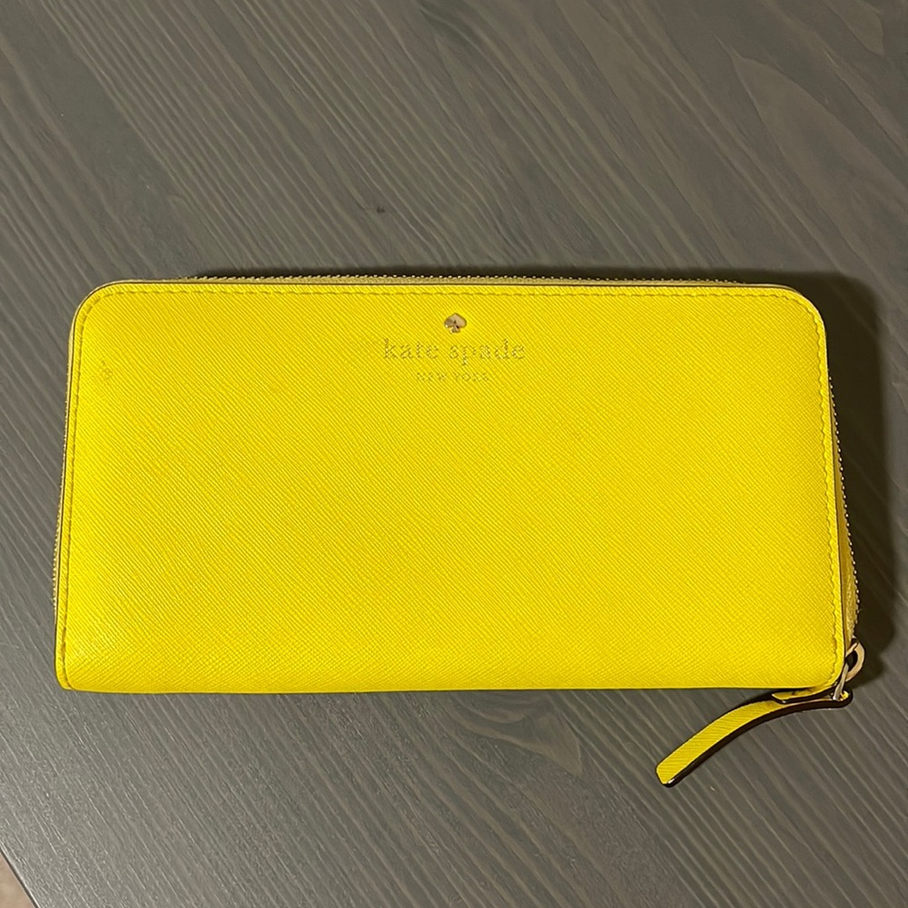 Yellow Kate Spade handheld wallet